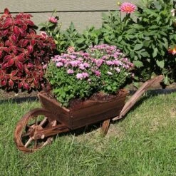 Sunnydaze Decor Sunnydaze Wooden Decorative Wheelbarrow Planter For Patio, Lawn And Garden - 35" L X 10" W X 11" - Brown 8 Sunnydaze Decor Sunnydaze Wooden Decorative Wheelbarrow Planter For Patio, Lawn And Garden - 35" L X 10" W X 11" - Brown -Outdoor Garden Store GUEST 184c9e78 69a1 486d 9b8a 096da196070c